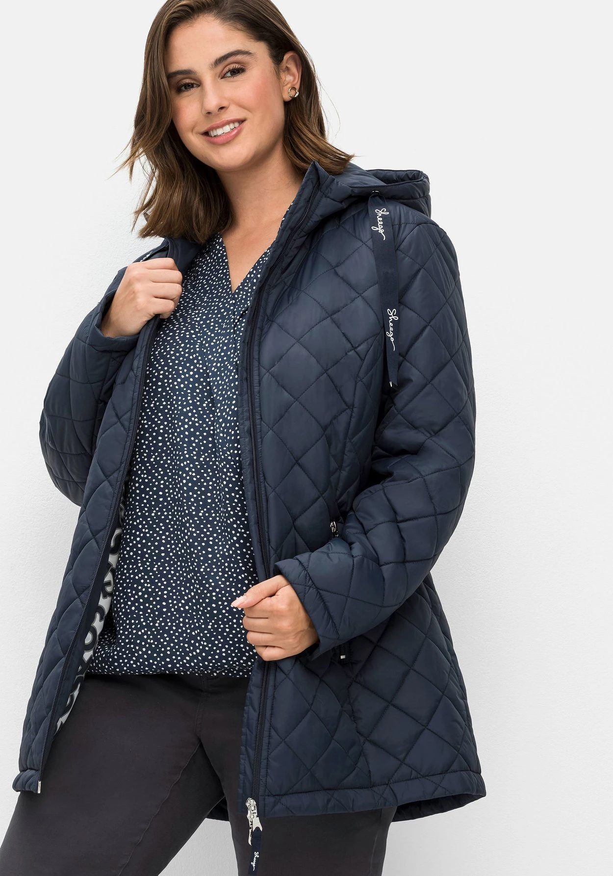 Sheego Steppjacke Mit Kapuze Und Bedrucktem Futter 3 Sheego Steppjacke Mit Kapuze Und Bedrucktem Futter